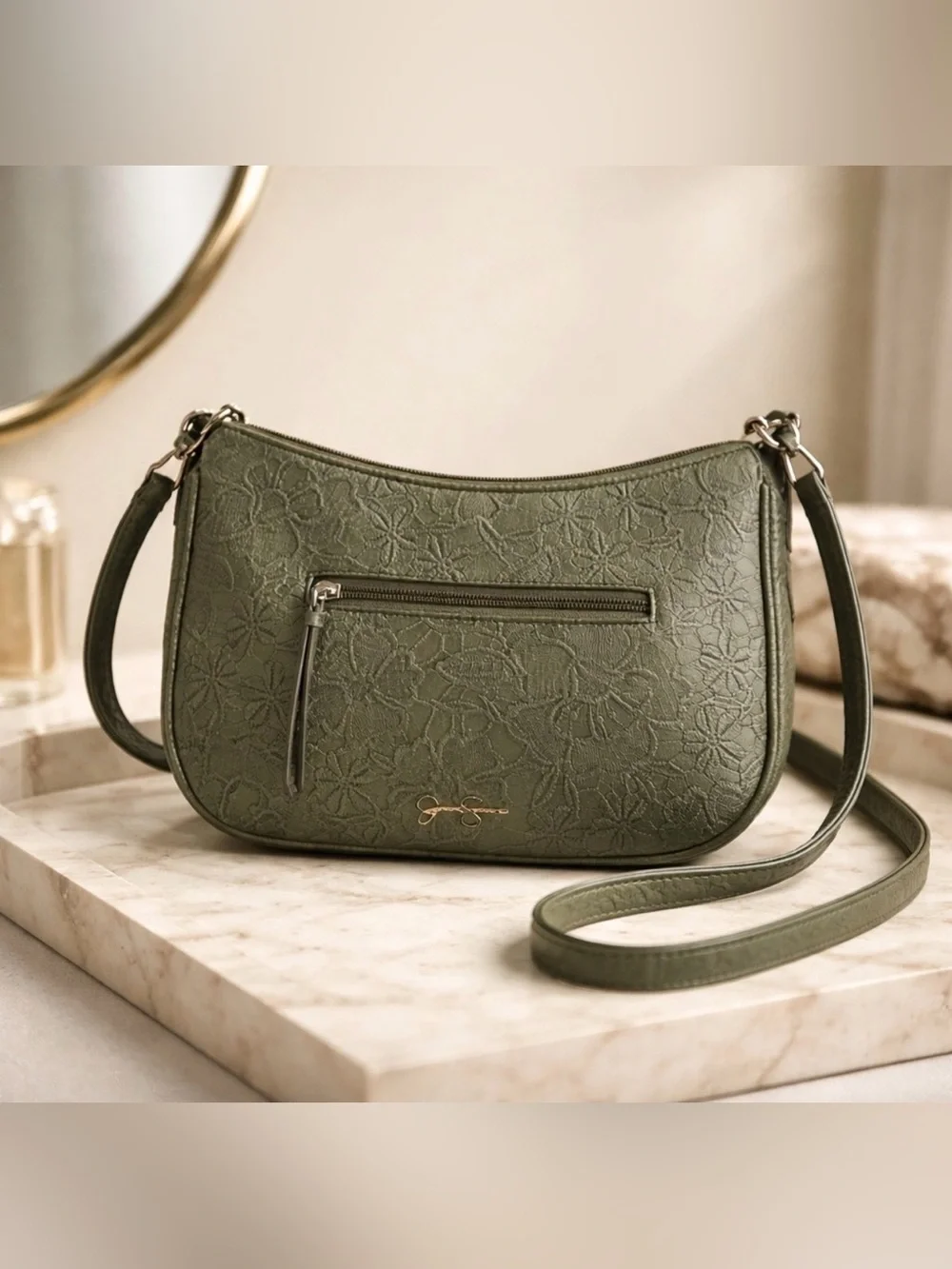 Jessica Simpson Gloria Mid Crossbody Bag in an embossed olive green floral finis